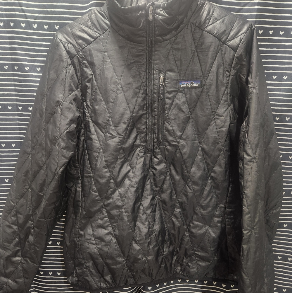 Womens quilted half zip nano puff with primaloft insulation.